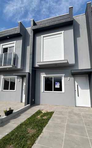 Casa à venda com 67m², 2 quartos e 1 vaga Casa à venda com 67m², 2 quartos e 1 vagaFachada