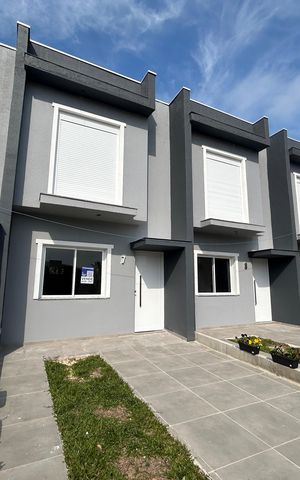 Casa à venda com 67m², 2 quartos e 1 vaga Casa à venda com 67m², 2 quartos e 1 vagaFachada