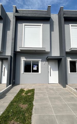 Casa à venda com 67m², 2 quartos e 1 vaga Casa à venda com 67m², 2 quartos e 1 vagaFachada