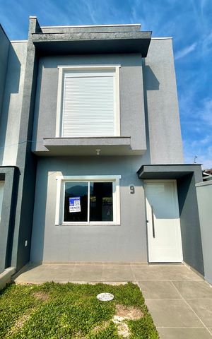 Casa à venda com 67m², 2 quartos e 1 vaga Casa à venda com 67m², 2 quartos e 1 vagaFachada