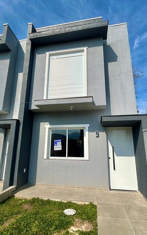 Casa à venda com 67m², 2 quartos e 1 vaga Casa à venda com 67m², 2 quartos e 1 vagaFachada