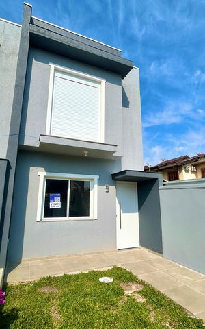 Casa à venda com 67m², 2 quartos e 1 vaga Casa à venda com 67m², 2 quartos e 1 vagaFachada