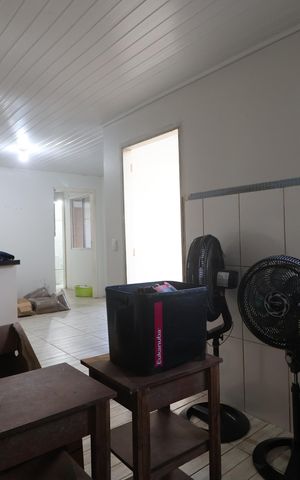 Casa à venda com 130m², 4 quartos e 2 vagasCozinha/casa fundos