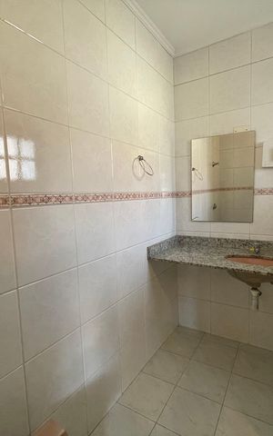 Casa de condomínio para alugar com 326m², 4 quartos e 6 vagasBanheiro da Suíte 2