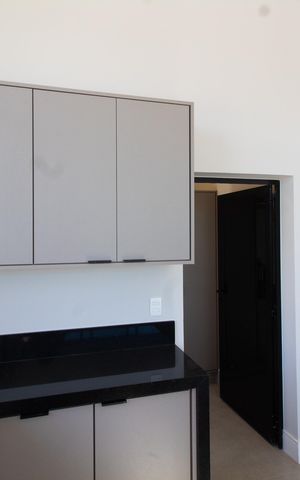Casa de condomínio à venda com 411m², 4 quartos e 4 vagas Casa de condomínio à venda com 411m², 4 quartos e 4 vagasCozinha