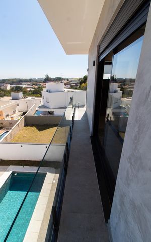 Casa de condomínio à venda com 411m², 4 quartos e 4 vagas Casa de condomínio à venda com 411m², 4 quartos e 4 vagasVista Sacada da Suíte 1