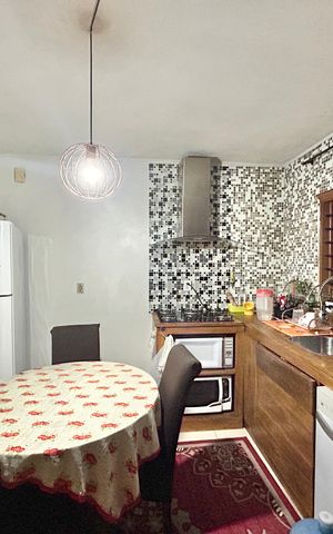 Casa à venda com 90m², 4 quartos e 3 vagas Casa à venda com 90m², 4 quartos e 3 vagasCozinha