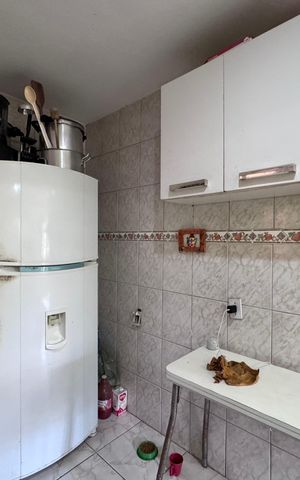 Casa de condomínio à venda com 150m², 2 quartos e 2 vagas Casa de condomínio à venda com 150m², 2 quartos e 2 vagasCozinha e Área de Serviço
