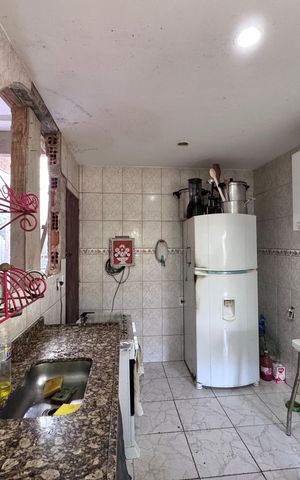 Casa de condomínio à venda com 150m², 2 quartos e 2 vagas Casa de condomínio à venda com 150m², 2 quartos e 2 vagasCozinha e Área de Serviço