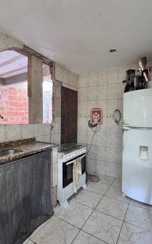 Casa de condomínio à venda com 150m², 2 quartos e 2 vagas Casa de condomínio à venda com 150m², 2 quartos e 2 vagasCozinha e Área de Serviço