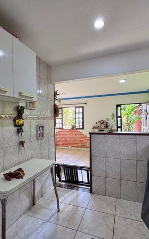 Casa de condomínio à venda com 150m², 2 quartos e 2 vagas Casa de condomínio à venda com 150m², 2 quartos e 2 vagasCozinha e Área de Serviço