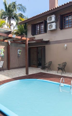 Casa à venda com 258m², 4 quartos e 4 vagasQuintal