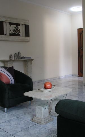 Casa à venda com 585m², 5 quartos e 6 vagasSala