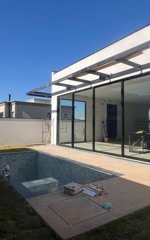 Casa de condomínio à venda com 428m², 4 quartos e 4 vagas