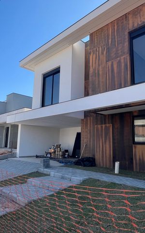 Casa de condomínio à venda com 428m², 4 quartos e 4 vagas
