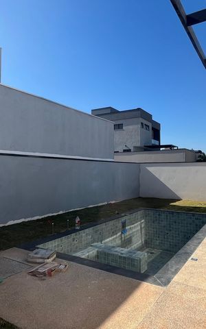 Casa de condomínio à venda com 428m², 4 quartos e 4 vagas
