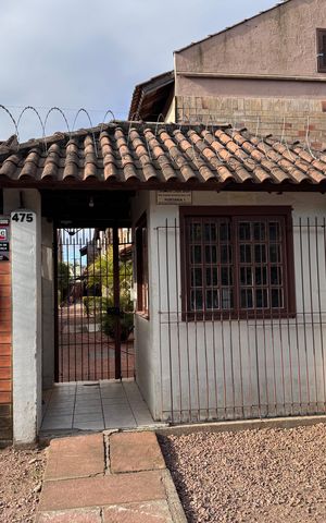 Casa para alugar com 50m², 2 quartos e 1 vaga Casa para alugar com 50m², 2 quartos e 1 vagaplaquinha fachada