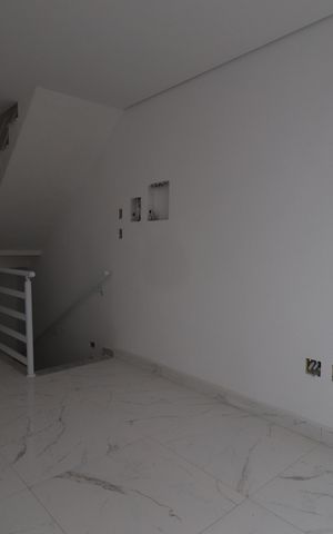 Casa de condomínio à venda com 127m², 3 quartos e 2 vagasSala