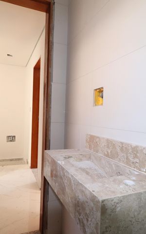 Casa de condomínio à venda com 127m², 3 quartos e 2 vagasBanheiro 
