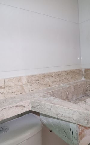 Casa de condomínio à venda com 127m², 3 quartos e 2 vagasBanheiro da Suíte