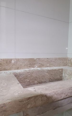 Casa de condomínio à venda com 117m², 2 quartos e 2 vagasBanheiro da Suíte 1