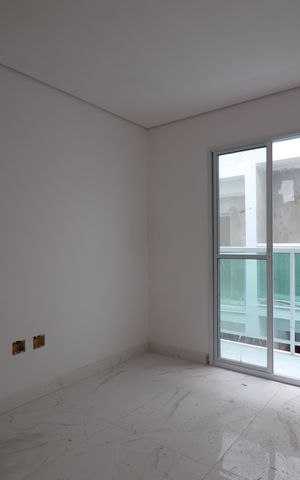 Casa de condomínio à venda com 117m², 2 quartos e 2 vagasSala
