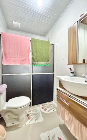 Casa à venda com 141m², 3 quartos e 2 vagas Casa à venda com 141m², 3 quartos e 2 vagasBanheiro