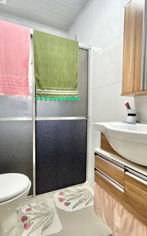 Casa à venda com 141m², 3 quartos e 2 vagas Casa à venda com 141m², 3 quartos e 2 vagasBanheiro
