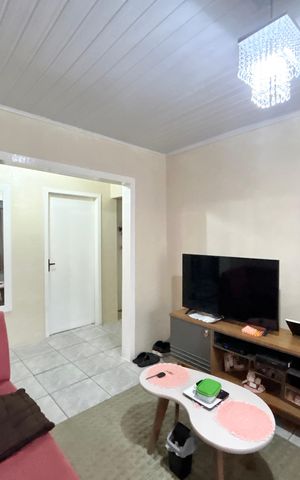 Casa à venda com 141m², 3 quartos e 2 vagas Casa à venda com 141m², 3 quartos e 2 vagasSala