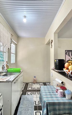 Casa à venda com 141m², 3 quartos e 2 vagas Casa à venda com 141m², 3 quartos e 2 vagasCozinha