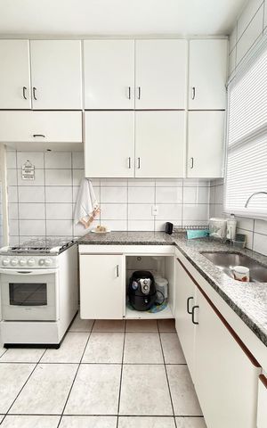 Apartamento à venda com 110m², 3 quartos e 2 vagas Apartamento à venda com 110m², 3 quartos e 2 vagasCozinha
