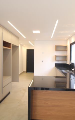 Casa de condomínio para alugar com 460m², 4 quartos e 4 vagasCozinha