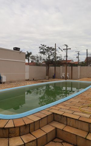Casa de condomínio à venda com 120m², 3 quartos e 3 vagasÁrea comum - Piscina