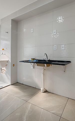 Apartamento à venda com 37m², 2 quartos e 1 vaga Apartamento à venda com 37m², 2 quartos e 1 vagaCozinha e Área de Serviço