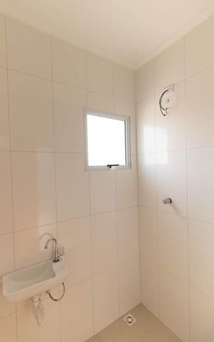 Casa de condomínio à venda com 55m², 2 quartos e 1 vaga Casa de condomínio à venda com 55m², 2 quartos e 1 vagaBanheiro da Suíte 1