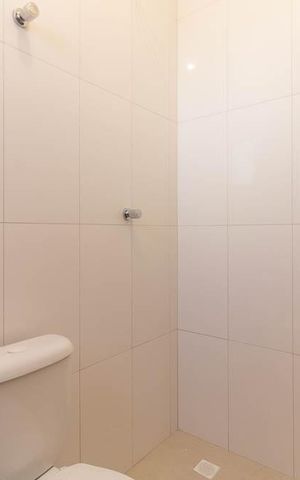 Casa de condomínio à venda com 55m², 2 quartos e 1 vaga Casa de condomínio à venda com 55m², 2 quartos e 1 vagaBanheiro da Suíte 2