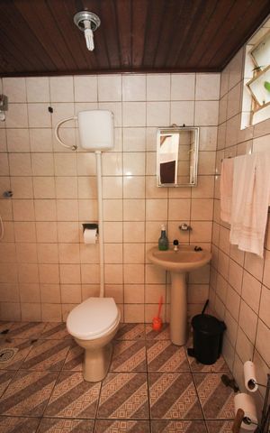 Casa à venda com 70m², 2 quartos e 1 vaga Casa à venda com 70m², 2 quartos e 1 vagaBanheiro de serviço