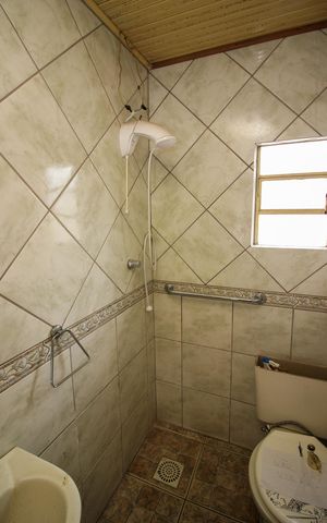 Casa à venda com 70m², 2 quartos e 1 vaga Casa à venda com 70m², 2 quartos e 1 vagaBanheiro