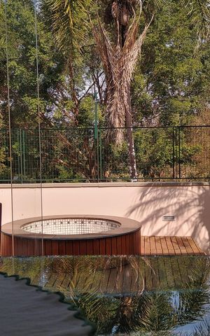 Casa de condomínio à venda com 290m², 4 quartos e 6 vagas Casa de condomínio à venda com 290m², 4 quartos e 6 vagasÁrea Externa