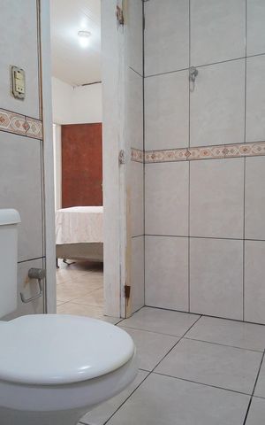 Casa para alugar com 130m², 2 quartos e 2 vagasBanheiro da Suíte 2