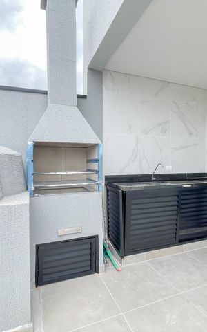 Casa de condomínio à venda com 68m², 2 quartos e 2 vagas Casa de condomínio à venda com 68m², 2 quartos e 2 vagasÁrea comum - Churrasqueira