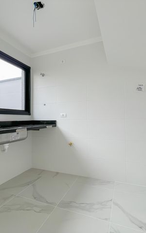 Casa de condomínio à venda com 68m², 2 quartos e 2 vagas Casa de condomínio à venda com 68m², 2 quartos e 2 vagasCozinha