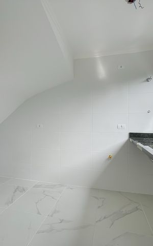 Casa de condomínio à venda com 67m², 2 quartos e 2 vagas Casa de condomínio à venda com 67m², 2 quartos e 2 vagasCozinha