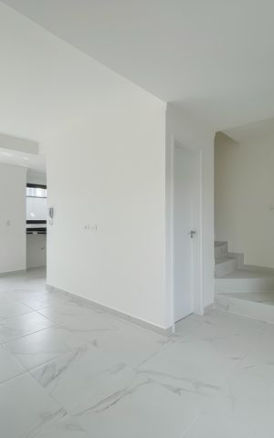 Casa de condomínio à venda com 68m², 2 quartos e 2 vagas Casa de condomínio à venda com 68m², 2 quartos e 2 vagasSala