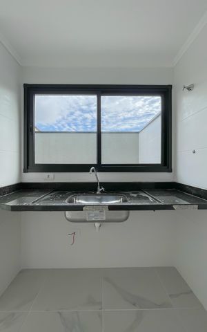 Casa de condomínio à venda com 68m², 2 quartos e 2 vagas Casa de condomínio à venda com 68m², 2 quartos e 2 vagasCozinha