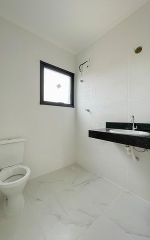 Casa de condomínio à venda com 67m², 2 quartos e 2 vagas Casa de condomínio à venda com 67m², 2 quartos e 2 vagasBanheiro da Suíte 1