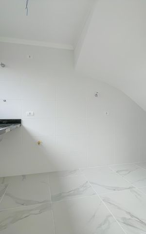 Casa de condomínio à venda com 67m², 2 quartos e 2 vagas Casa de condomínio à venda com 67m², 2 quartos e 2 vagasCozinha