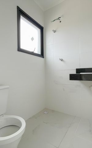 Casa de condomínio à venda com 67m², 2 quartos e 2 vagas Casa de condomínio à venda com 67m², 2 quartos e 2 vagasBanheiro da Suíte 2
