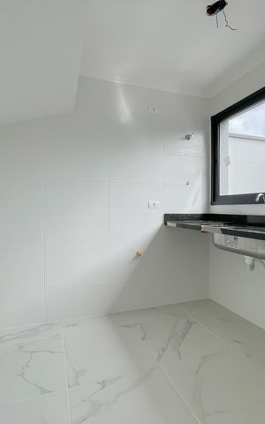Casa de condomínio à venda com 68m², 2 quartos e 2 vagas Casa de condomínio à venda com 68m², 2 quartos e 2 vagasCozinha
