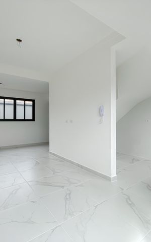 Casa de condomínio à venda com 68m², 2 quartos e 2 vagas Casa de condomínio à venda com 68m², 2 quartos e 2 vagasSala